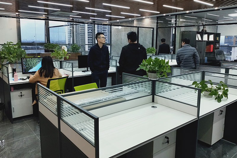 MXFridge modern corporate office with cold chain operations team monitoring global logistics data